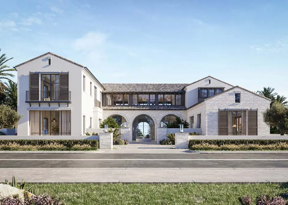Wadeem: two-storey villa with a gabled roof and arched loggia seen from the street, an example in Modon's design guidance, Modon image from the Wadeem brochure