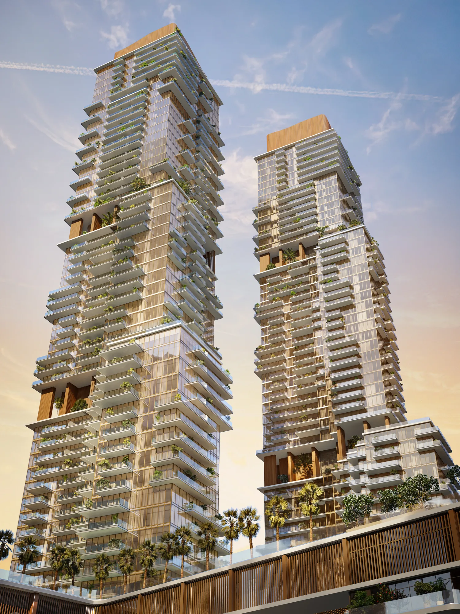 Two of the towers seen from below: stepped terraces with planting and warm wood fins