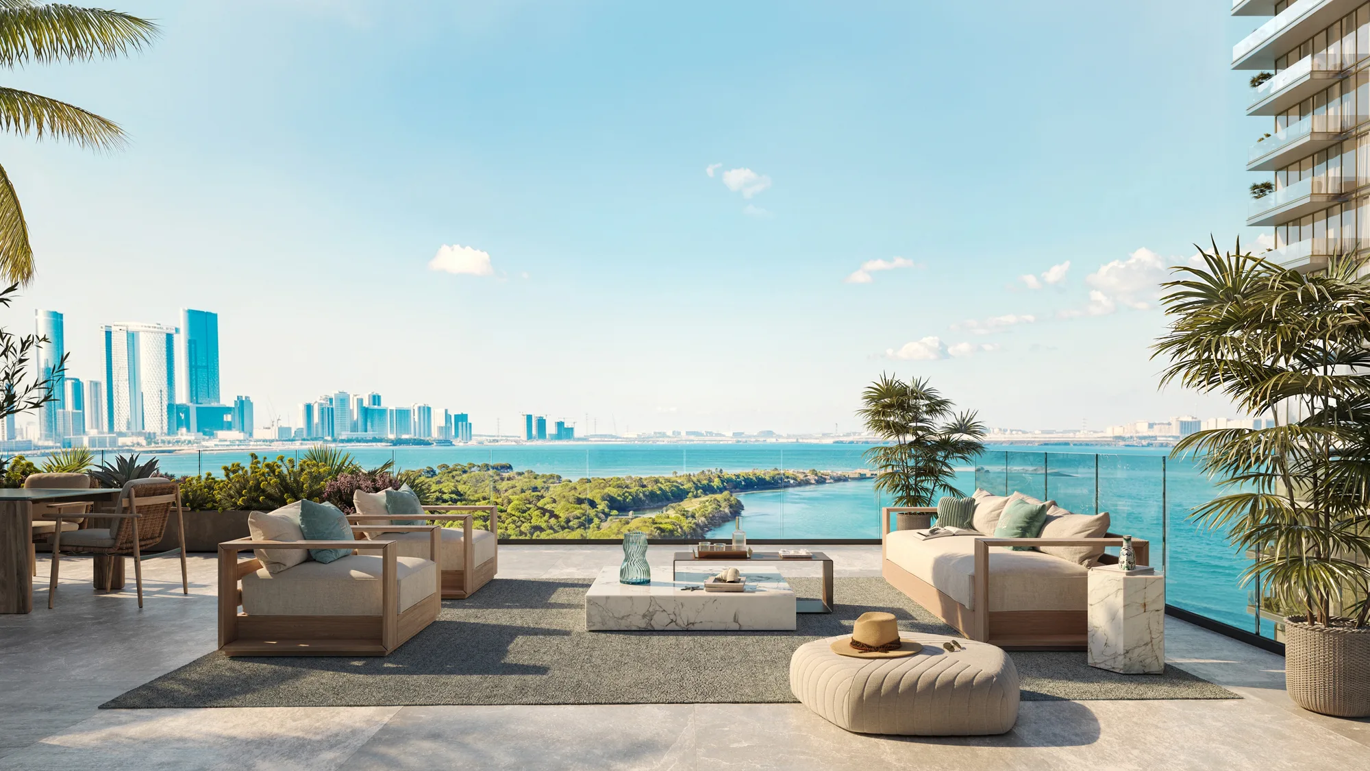 A furnished apartment terrace looking over the water and mangroves towards the city skyline