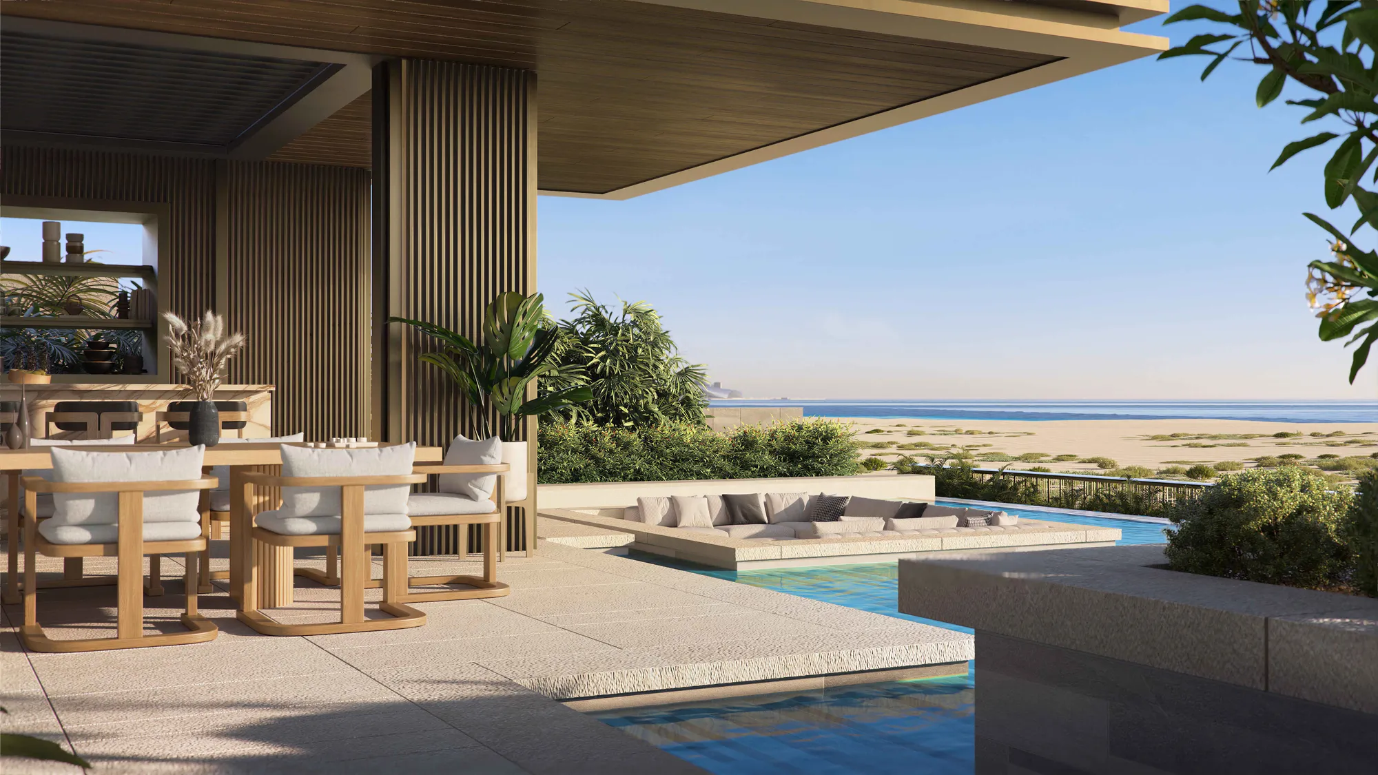 A covered terrace dining table looking over the dunes to the sea