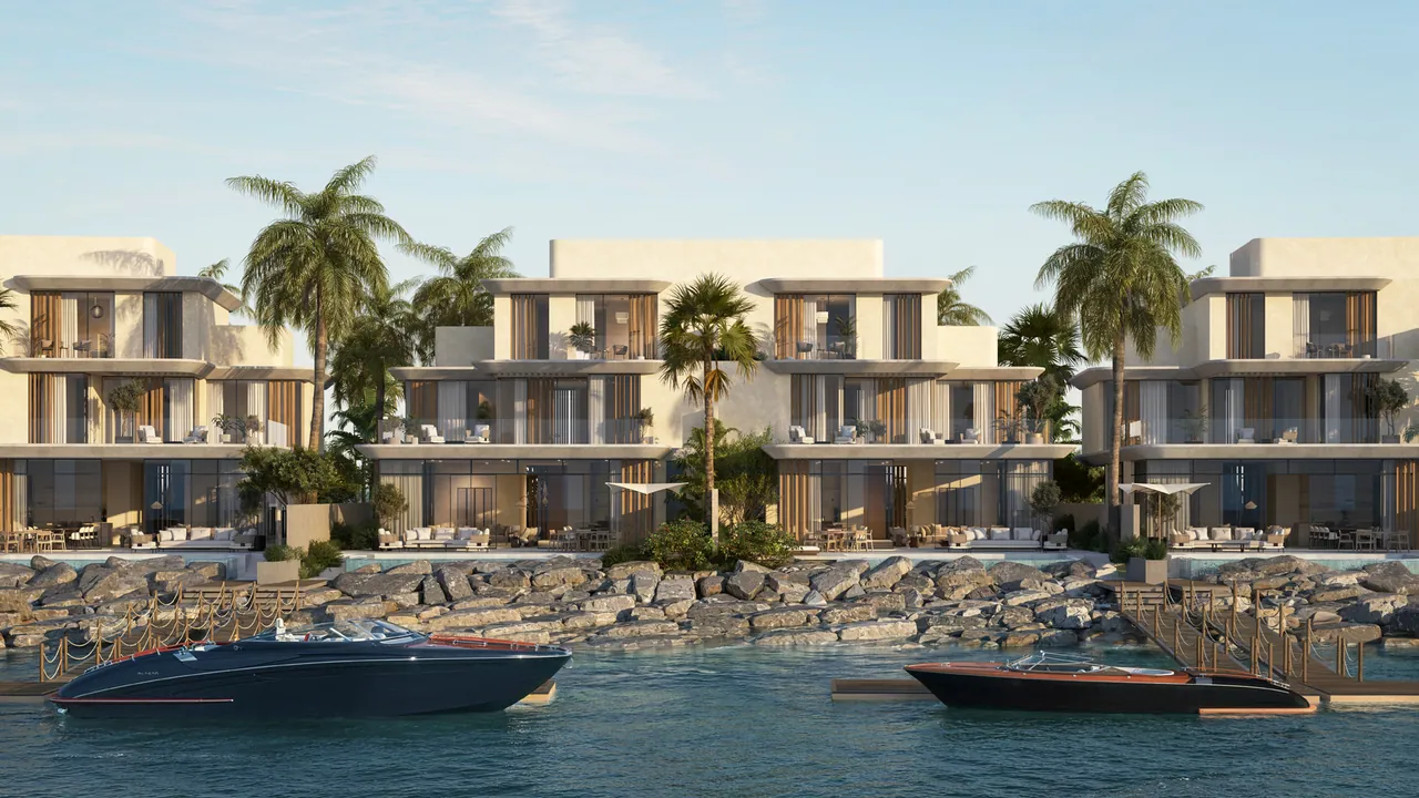 The villas from the water at dusk, boats at the docks
