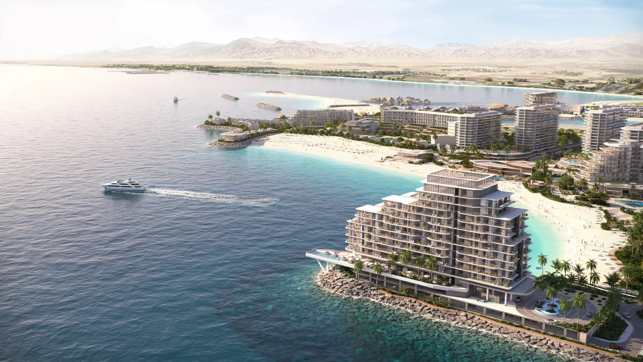 Hayat Island from the sea: the Anantara tower and the villa shore